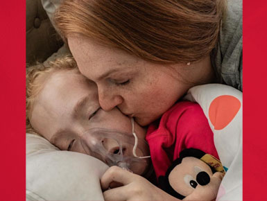 Eleanor Turner, gives her son, Owen, a kiss on the cheek.