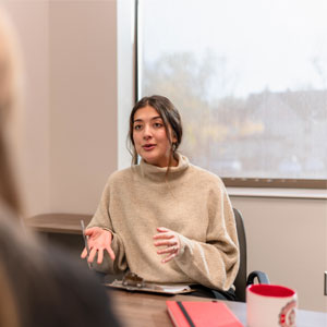 A clinical psychology student talks to a client in the Psychological Services Center.