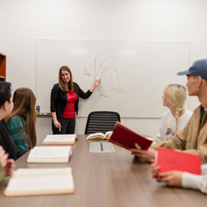 BreAnne Danzi teaches her students at the front of an intimate classroom.